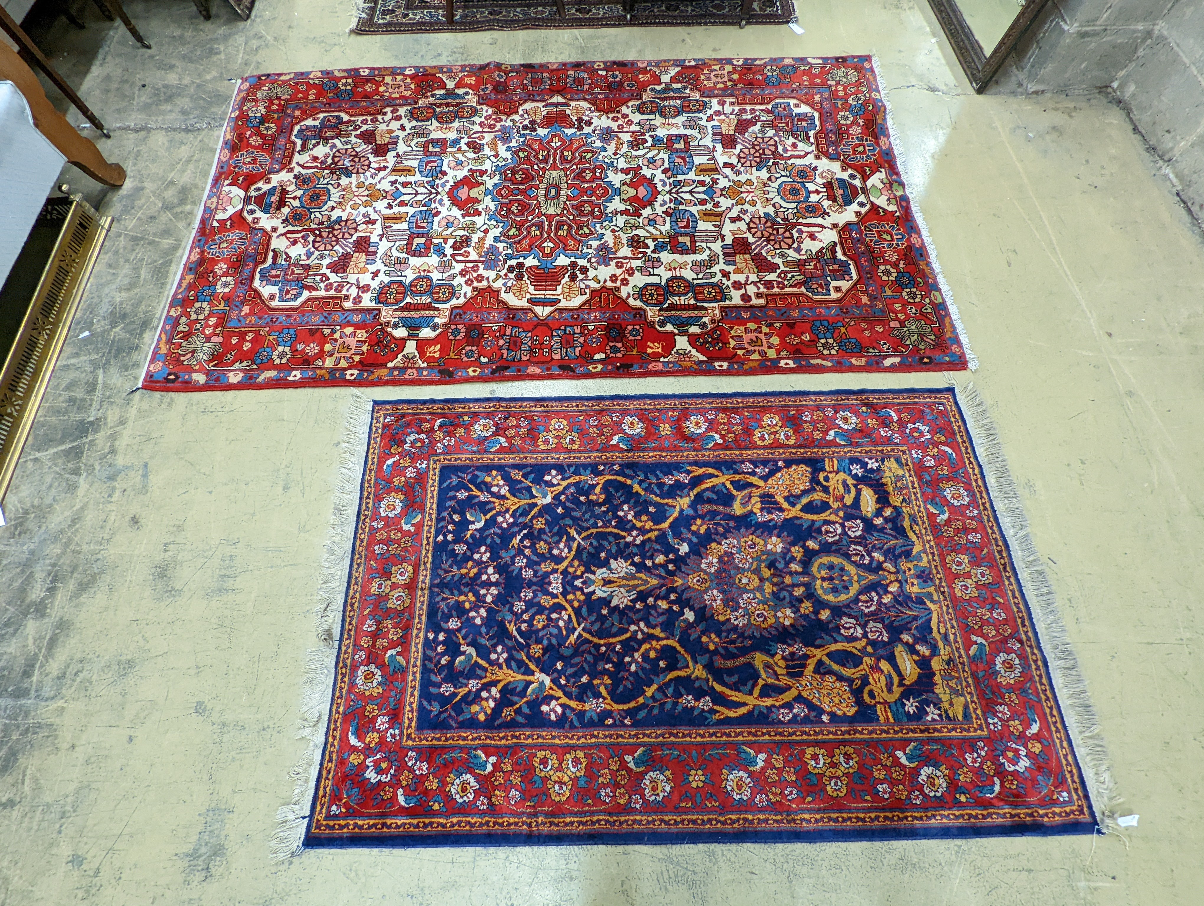 A Caucasian design ivory ground carpet, 260 x 158cm together with a smaller Tabriz style Tree of Life rug